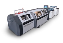 Universe Sewing Web-fed, automatic book folding and sewing line for the production of books directly from the roll.